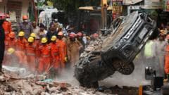 Dozens feared trapped in collapsed building in Delhi